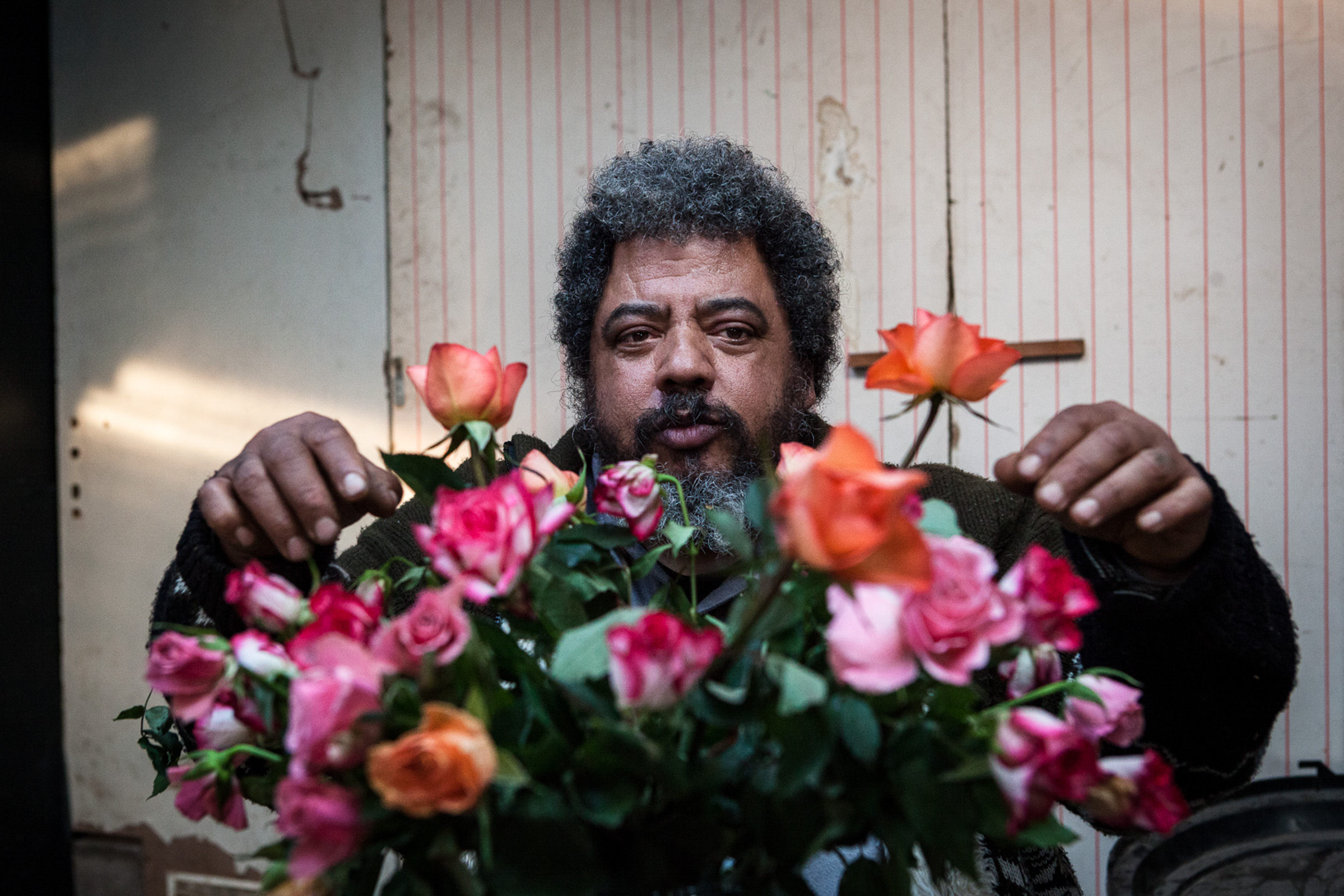 Villebeéon, le 30 Janvier 2014. Patrick arrange les fleurs offertes par un supermarché des environs.

Villebeéon, January 30, 2014. Patrick arranges the flowers offered by a supermarket nearby.